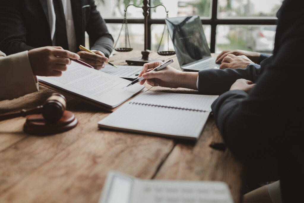 business people negotiating a contract, discussing contract whil